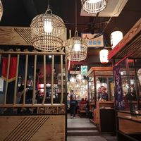 Interior, some booths, some tables :) at Takumi Ramen Kitchen in Vienna