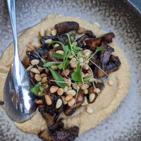 Hummus chaud, champignons braisés, noix de pin at TERRA in Funchal