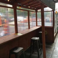 Here is the outdoor eating; there is no room to eat indoors. at Burrito Box in New York City