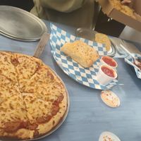 Vegan pepperoni pizza, vegan cheesebread, vegan meatballs (out of frame, VERY happy vegans!) at Slice and Dice Pizzeria in Albuquerque