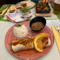 Vegetarian enchilada (asked for no cheese) and in the background vegetarian fajitas (come with cheese in a separate pot).  at Taco&Burrito in Albufeira