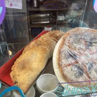 Empanadas and pizza  at Supanta in Lima