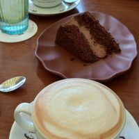 Chocolate and cherry cake with soya cappuccino. at Neighbours in Tenerife