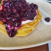 Vegan fluffy pancakes with soy yoghurt and blueberries at Neighbours in Tenerife