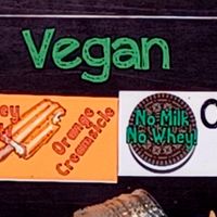 Vegan options on the menu board at Josh & John's in Fort Collins