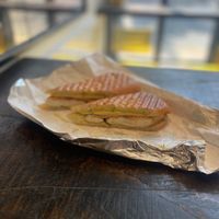 C.B.N: tofu, smoked yuba, cheese, pickles and mayo on a pressed roll. Yum! at A. T. M. Vegan Deli in Brooklyn