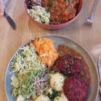 Lovely colourful and tasty food. Vegan chop, and a stew. at Green Way - Food For Life in Sopot