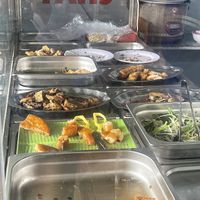 Those are for the plate and meal boxes   at Quán Chay Thiện Tâm in Nha Trang