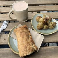 Vegan sausage roll, roast potatoes and chai   at Zola's Bakery in Galashiels
