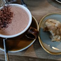 Lovely hot chocolate with oat milk and a Biscoff Cruffin. at Zola's Bakery in Galashiels