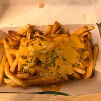 Plant Style Fries- Shoestring fries, vegan cheese, grilled onions, and plant sauce at Plantees in Orlando