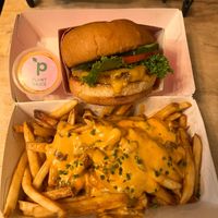 Single signature burger, plant style fries, and an extra side of plant sauce at Plantees in Orlando
