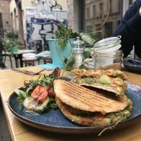 Vegan panini bread with avocado, arugula and homemade pesto  at Gretchens Villa in Hamburg