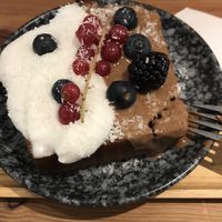 Vegan banana bread with coconut cream and berries   at Hanging Out Café in Hamburg