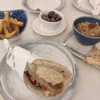 Chickpea pattie wrap, chips, olives and dip at Egeo - Ruzafa in Valencia