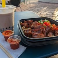 Boozy boba (rum + horchata + tapioca) Noodle bowl with tofu (protein 3x) Sriracha and soy sauce available on the side at Tuk Tuk Eatery in San Diego
