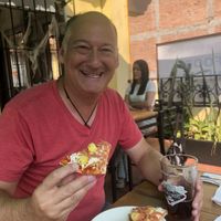 Vegan pizza on the patio  at Vegan&Beer in Mexico City