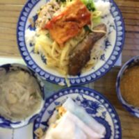 com and fresh spring rolls at Thanh Lieu in Hue