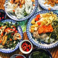 Fried noodles, banh beo, mixed vegetables, com (rice with mixed dishes and side soup) at Thanh Lieu in Hue