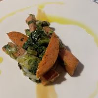 Seitan con indivia al limone su crema di mandorle   at Singola Ristorante Naturale in Modica