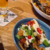 Vegan fried mushrooms & chicken with garlic sauce. Very small portion tho. (Already took 1 bite) at De Beren in Kerkrade
