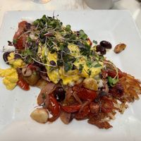 Mediterranean Hash - made with roasted garlic, super delicious, filling at Watusi in Hilton Head Island