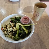 Caprese Tofu, Brocoli, and kale slaw with housemade sriracha on the side. at Fresh Kitchen in Gainesville