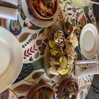 Sharing mezze platter and 3 of the small plates  at Otto Vegan Empire in Stockport