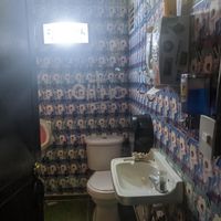 Men's bathroom  at Tamagotchi (filled with hentai) at Tamagotchi in Medellin