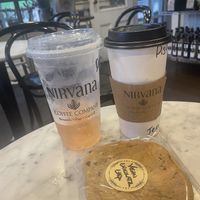 Delicious tea refresher, latte , and soft choc chip cookie   at Nirvana Coffee Company in Barnstable