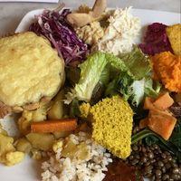 Plate with spinach potato pie  at Cafe Ginger in Paris