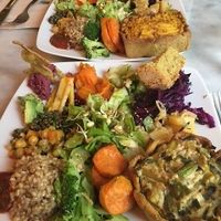 Quiche dishes with incredible veggie and grain sides!  at Cafe Ginger in Paris