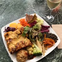 Vegan lasagna and white wine at Cafe Ginger in Paris