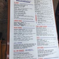 Menu in front: note that "V" stands for "vegetarian," not vegan. at 5 Napkin Burger in New York City