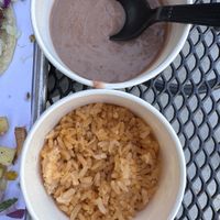 Sides of beans and rice(tiny portions)  at Vatos Tacos + Tequila at The Foundry in Loveland