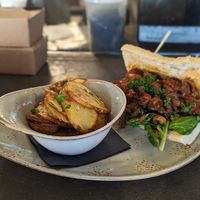 Zo boy with potatoes at Fern Flavors from the Garden in Charlotte