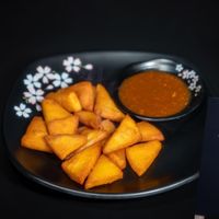 Crispy Fried Tofu (Burmese Tofu is made of chickpeas not with soybean) comes with chef special tamarind sauce. Our version of french fries. at Burmese Bites - Food Stall in Queens