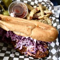 Memphis pulled pork sandwich to go! at Chomp Vegan Eatery in Vancouver