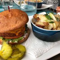 east side burger with poutine  at Chomp Vegan Eatery in Vancouver