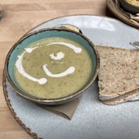 Sopa servida com pão e manteiga vegan!!😋  at Saramago Cafe Bar in Glasgow