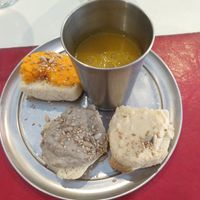Miniature soup, 3 slices of bread with toppings at Naturaleza Sabia in Buenos Aires