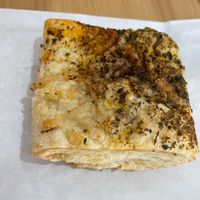 Spinach and cheese in a flaky crust  at Stephanie's Vegan Bakery + Cafe in Fort Lauderdale