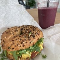 BEC with avocado, arugula and tomato with a Berry Smoothie  at Stephanie's Vegan Bakery + Cafe in Fort Lauderdale