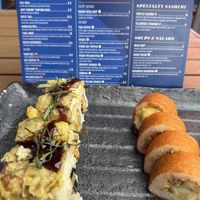 Cowgirl (R) and shiitake (L) with happy hour menu. Dedicated vegan section.  at Blue Sushi Sake Grill in Nashville