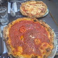 Marinara pizza (background is not-vegan, but they do have vegan cheese if preferred) at Acqua & Farina in Nice
