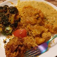Vegan lamb biriyani, saag aloo, tartan dal, onion bhaji at Takdhum in Farnborough