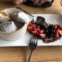 Fresh beignets and fruit, SO good!   at Vegan & Vine in Phoenix