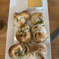 Garlic knots with cheese sauce  at Vegan & Vine in Phoenix