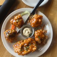 Crispy cauliflower— we got mango habanero   at Vegan & Vine in Phoenix