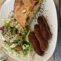 Vegetable strudel, salad & vegan chicken strips  at Yolo - Cafeteria & Bar in Mallorca